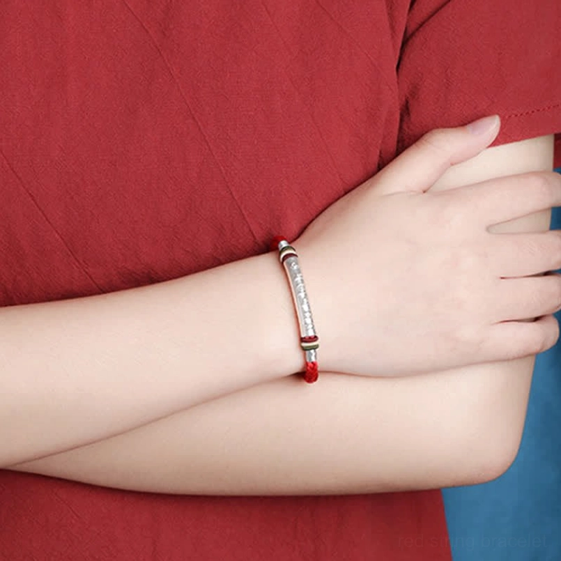 Om Mani Padme Hum silver bracelet worn on arm showing adjustable fit