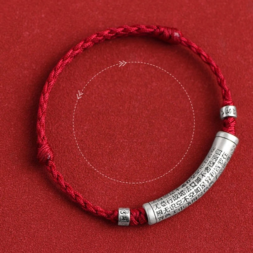 Handcrafted Heart Sutra bracelet flat lay with measurement guide and sizing reference lines