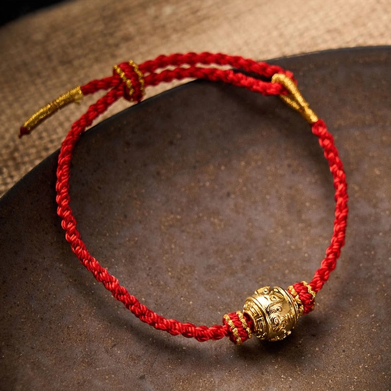 Om Mani Padme Hum red string bracelet styling and wear guide demonstration