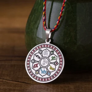 Om Mani Padme Hum titanium steel pendant with multicolor braided rope, silvery finish close-up