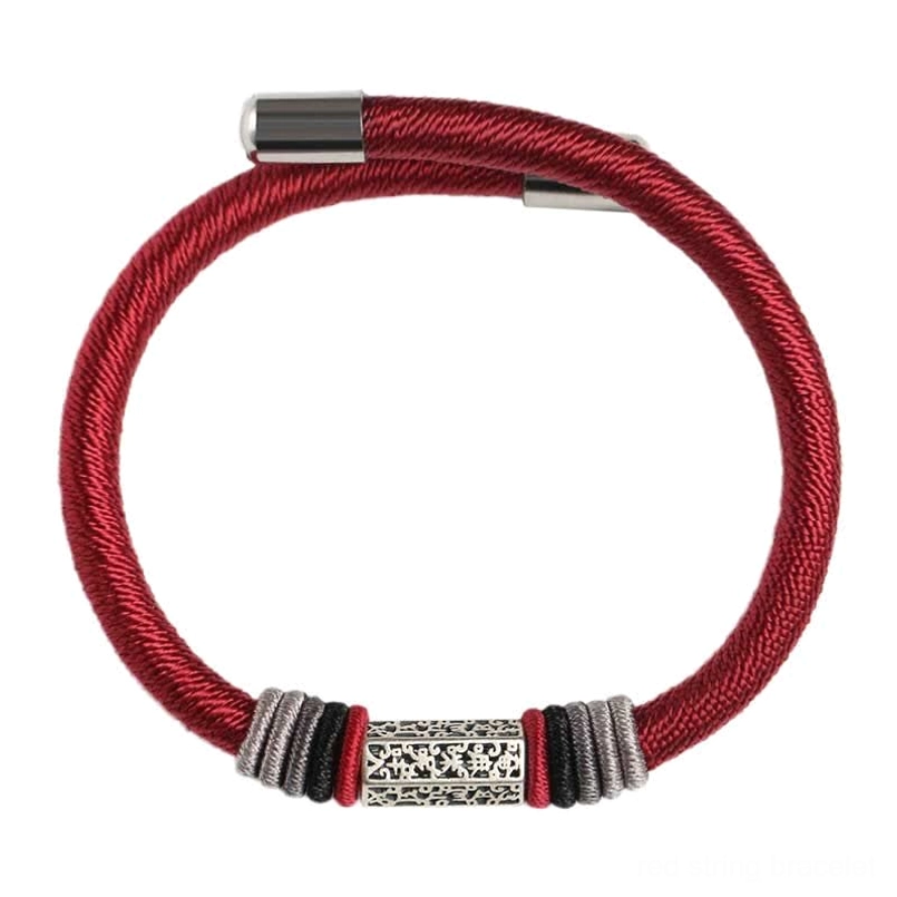 Complete Om Mani Padme Hum red string bracelet with engraved silver charm, flat lay on white background