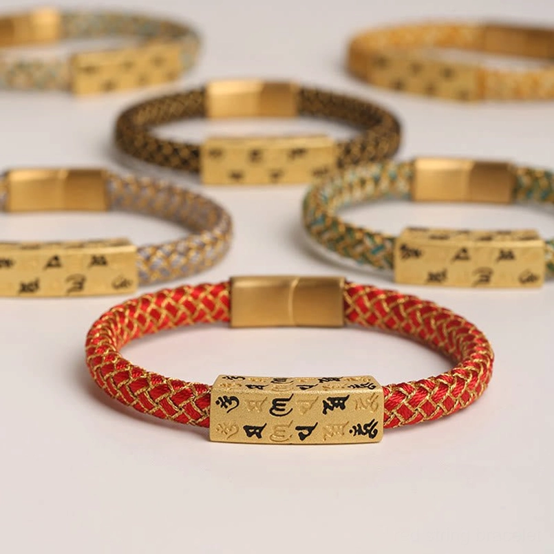 Close-up view of Om Mani Padme Hum Tibetan bracelet showing detailed rope weave and engraved mantra charm