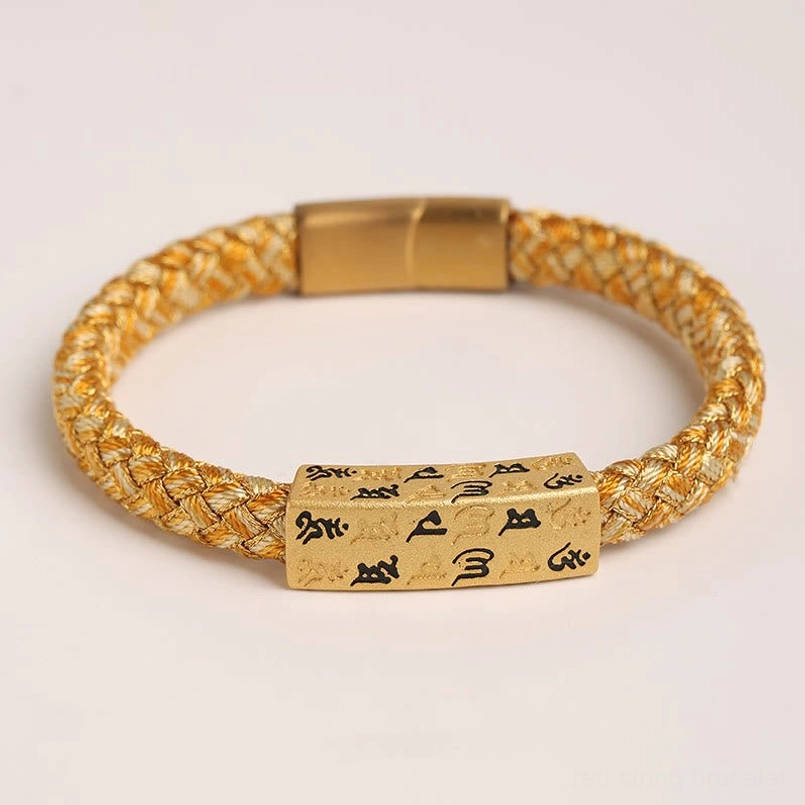 Top view of Om Mani Padme Hum Tibetan blessing bracelet showing woven rope pattern and gold clasp detail