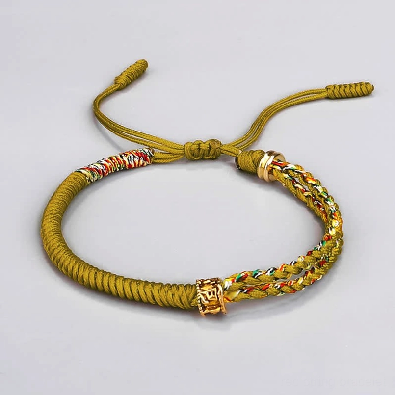 Om Mani Padme Hum yellow string bracelet with chakra colors - wrist wear lifestyle