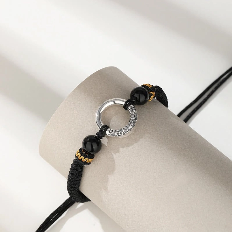Close-up Detail of 925 Sterling Silver Peace Buckle with Auspicious Cloud Motif and Gold-Wrapped Onyx Beads