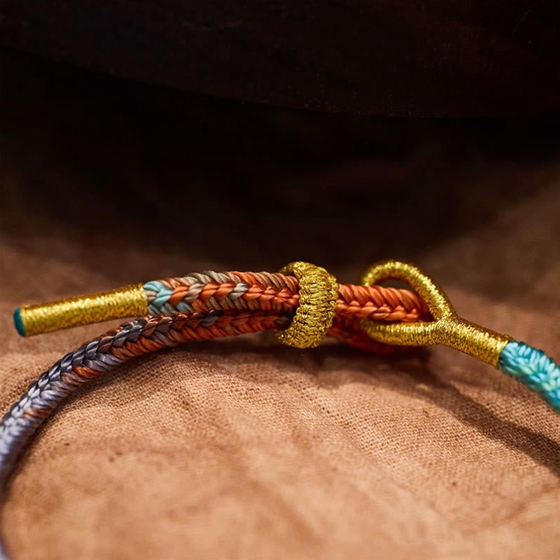 Bracelet clasp and adjustable knot closure with gold metal cord ends