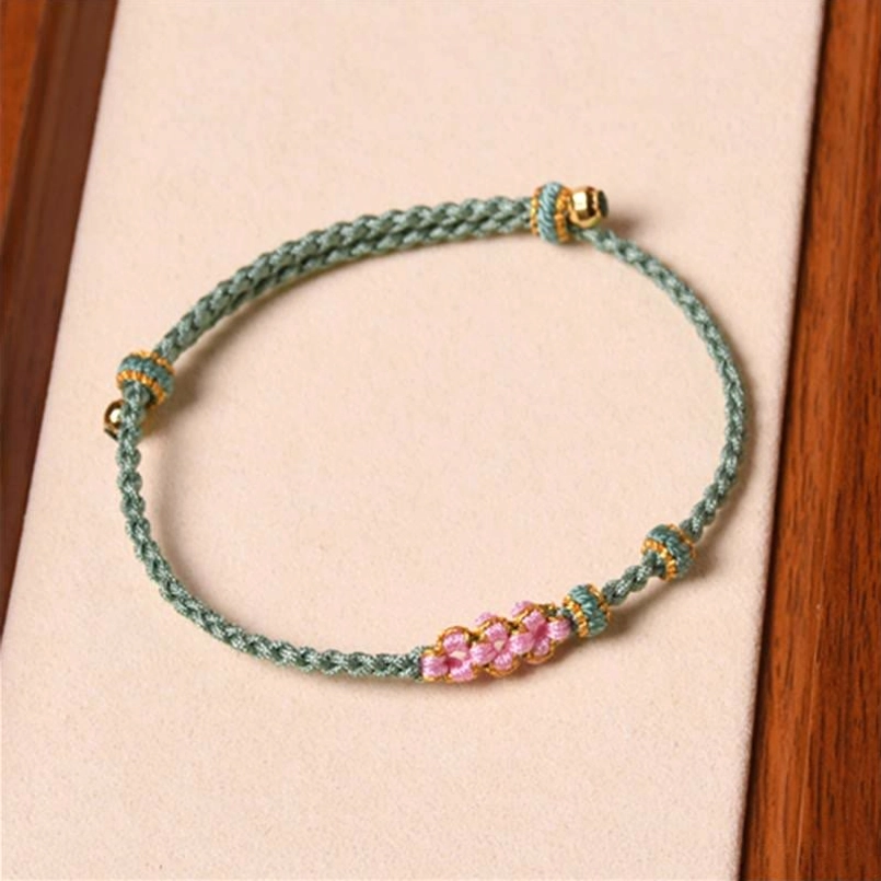 Green color peach blossom red string fate bracelet with gold accents