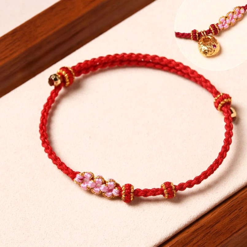 Peach blossom red string bracelet with three flower charms and inset pendant preview