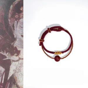 Peach blossom cinnabar red string bracelet eight-strand braided blessing with ancient mural background