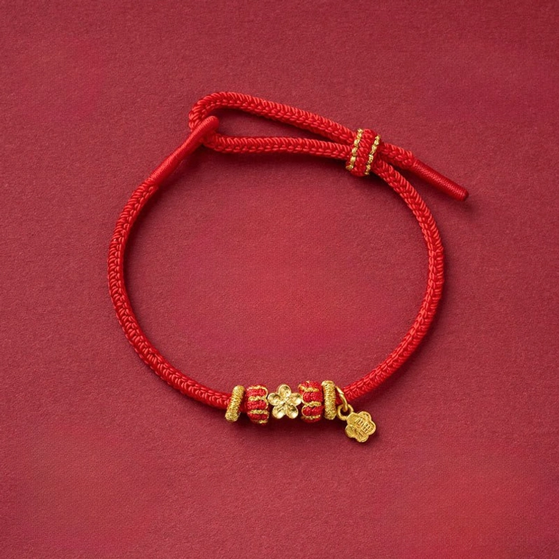 Peach blossom red string bracelet with multiple copper beads and flower-shaped copper charm