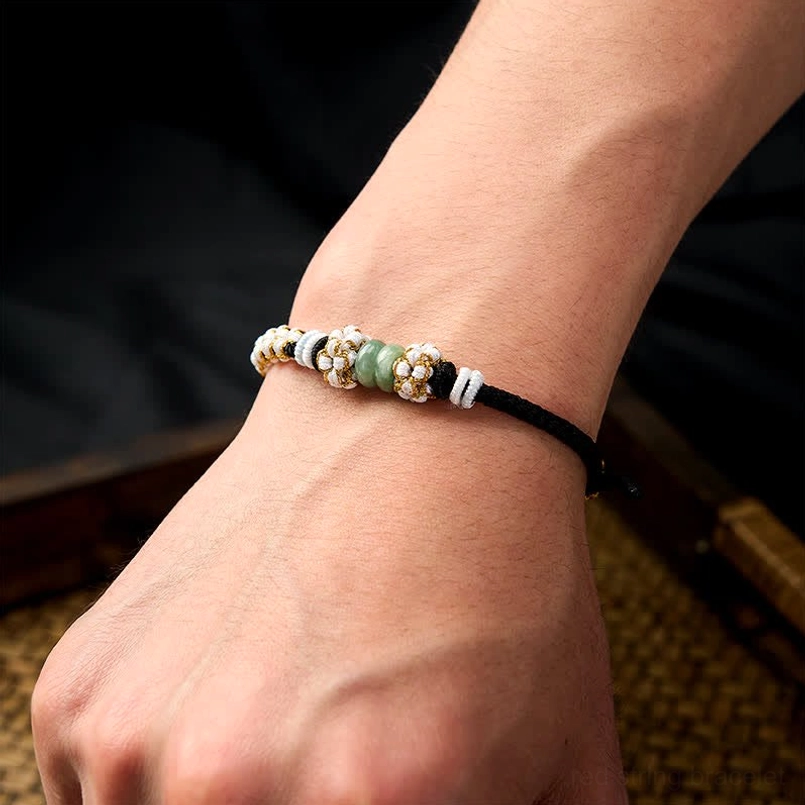 Pink Chinese knot bracelet with traditional braiding and jade beads