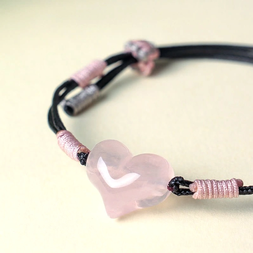 Pink crystal heart bracelet close up detail side view charm