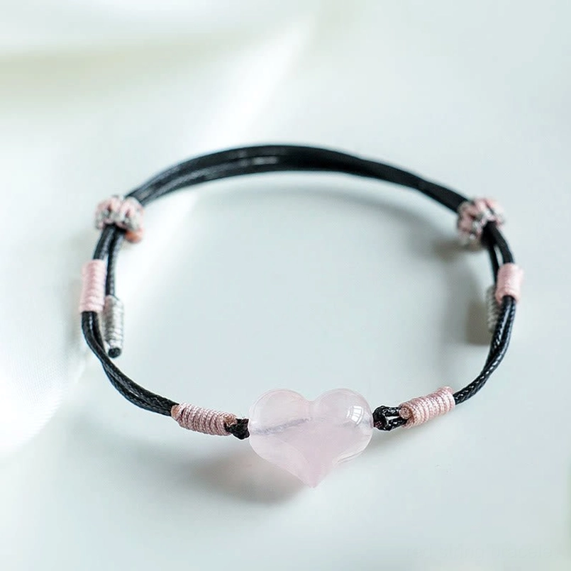 Pink crystal heart bracelet full view adjustable black cord