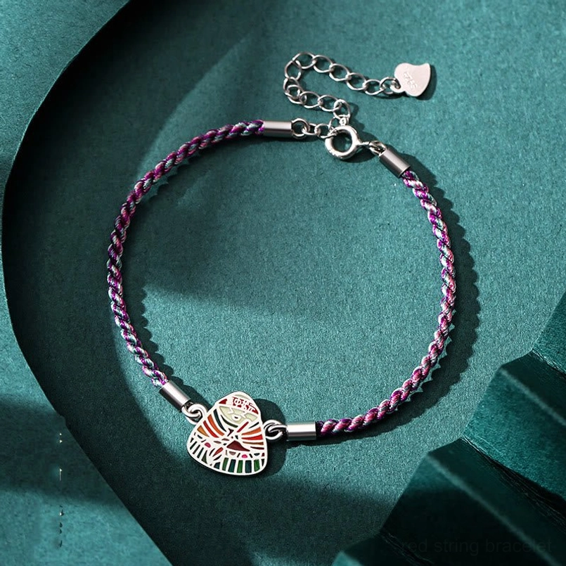 Pink multicolor zongzi charm 925 sterling silver red string bracelet flat lay