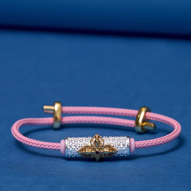 Pink string bracelet with multiple color enamel flower and precious metals