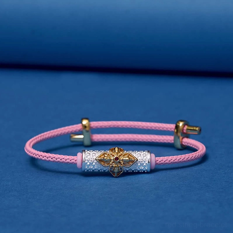 Pink string protection bracelet with ornate copper flower charm variant