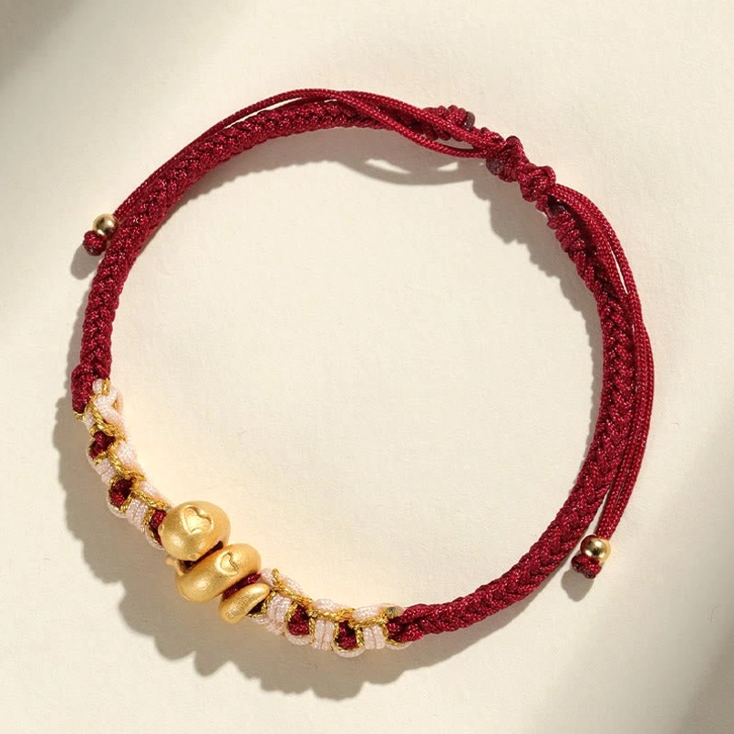 Pink string year of the snake peach blossom luck bracelet product shot