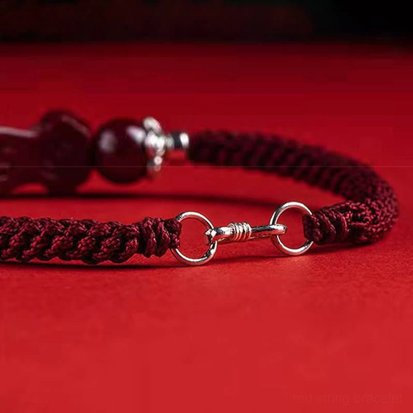 Pixiu cinnabar wealth bracelet lifestyle photo with protective red string