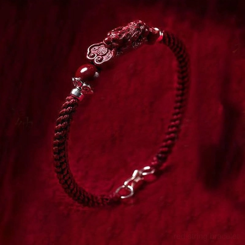 Dark red braided Pixiu cinnabar wealth bracelet with 925 silver clasp, side view