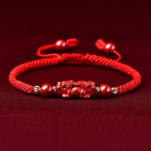 Pixiu cinnabar red string bracelet top-down view with adjustable sliding knot