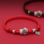 925 sterling silver Pixiu Fu wealth bracelet with red braided rope - dual bracelet display