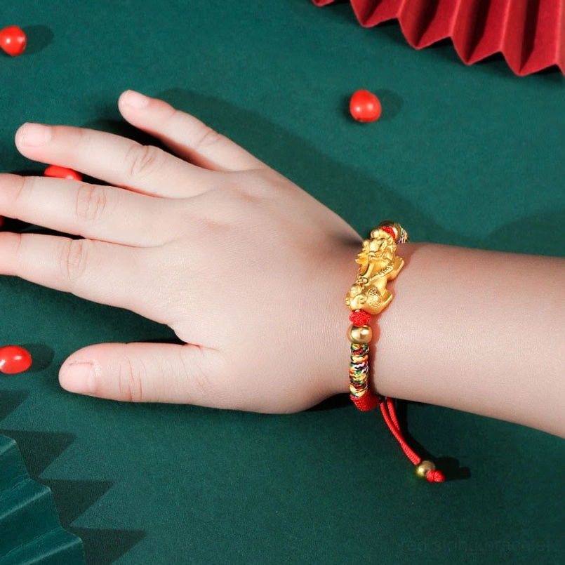 Adjustable red cord Pixiu kids bracelet side view showing sliding knot detail