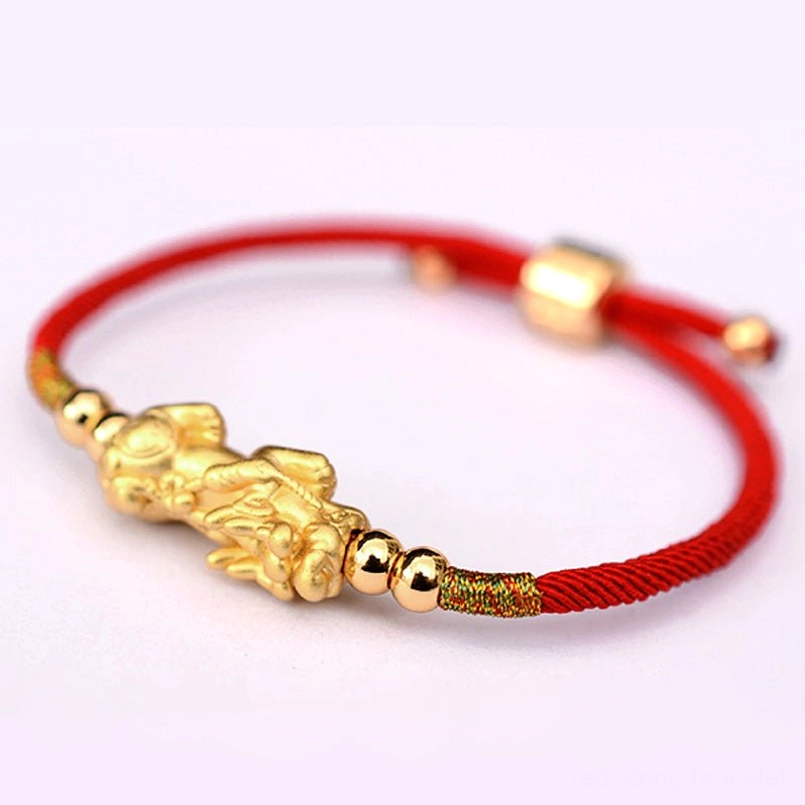 Pixiu luck bracelet with minimalist matte gold charm on white background