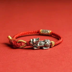 925 Sterling Silver Pixiu Om Mani Padme Hum red string protection bracelet with engraved charm on solid red background