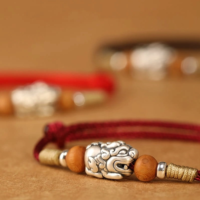 999 Sterling Silver Pixiu Charm with Peach Wood Beads - Low Angle View