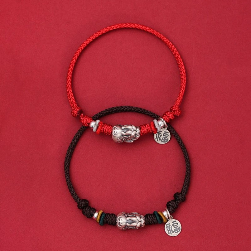 Matching red and brown Pixiu wealth bracelets with silver charms - pair display