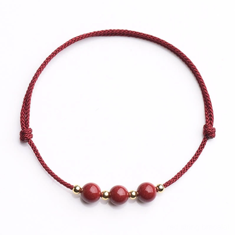 Premium braided red cord cinnabar bead bracelet craftsmanship detail