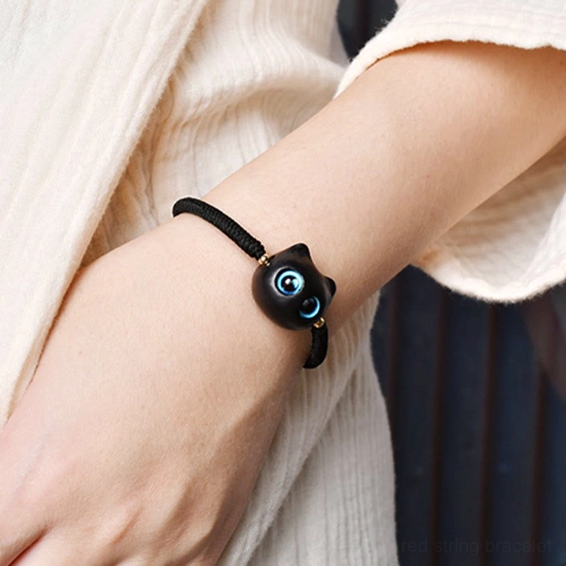 Premium ebony wood cat charm bracelet with braided rope and metal accents
