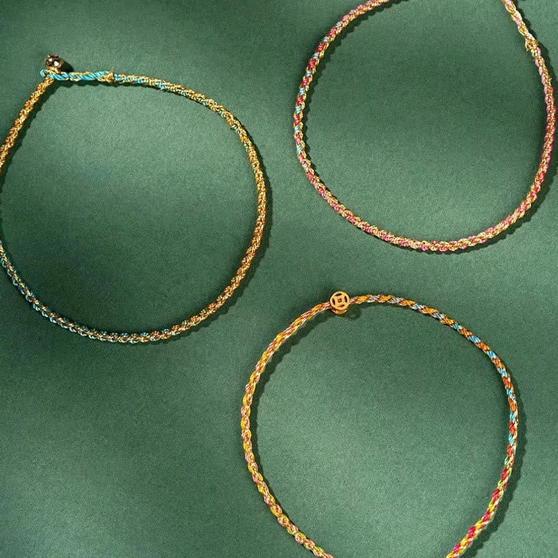 Premium colorful lucky coin bracelet with enhanced gold coin and multi-hued woven rope