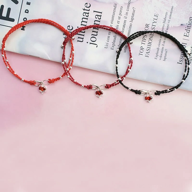 Premium red string ankle bracelet with heart pendant and infinity clasp, front-facing product view