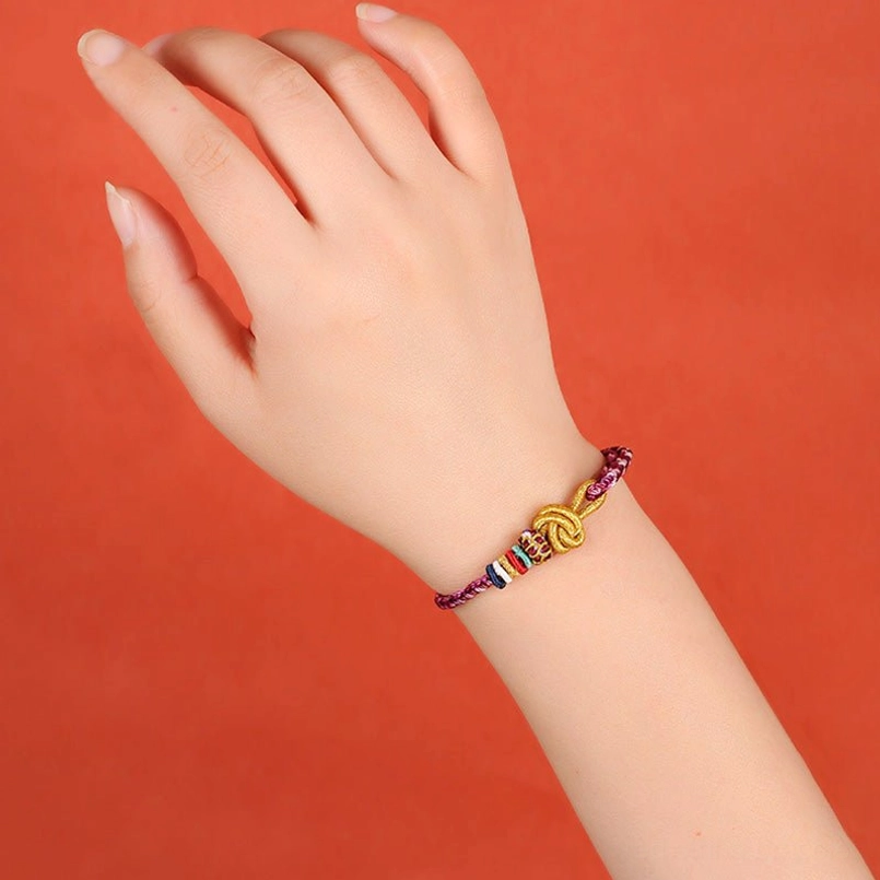 Colorful string protection bracelet worn on wrist demonstrating comfortable fit and flexibility