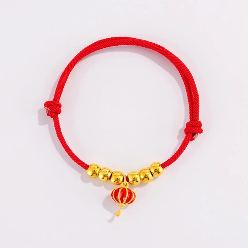 Protective red string pet collar with ornamental lantern pattern bead and adjustable sizing