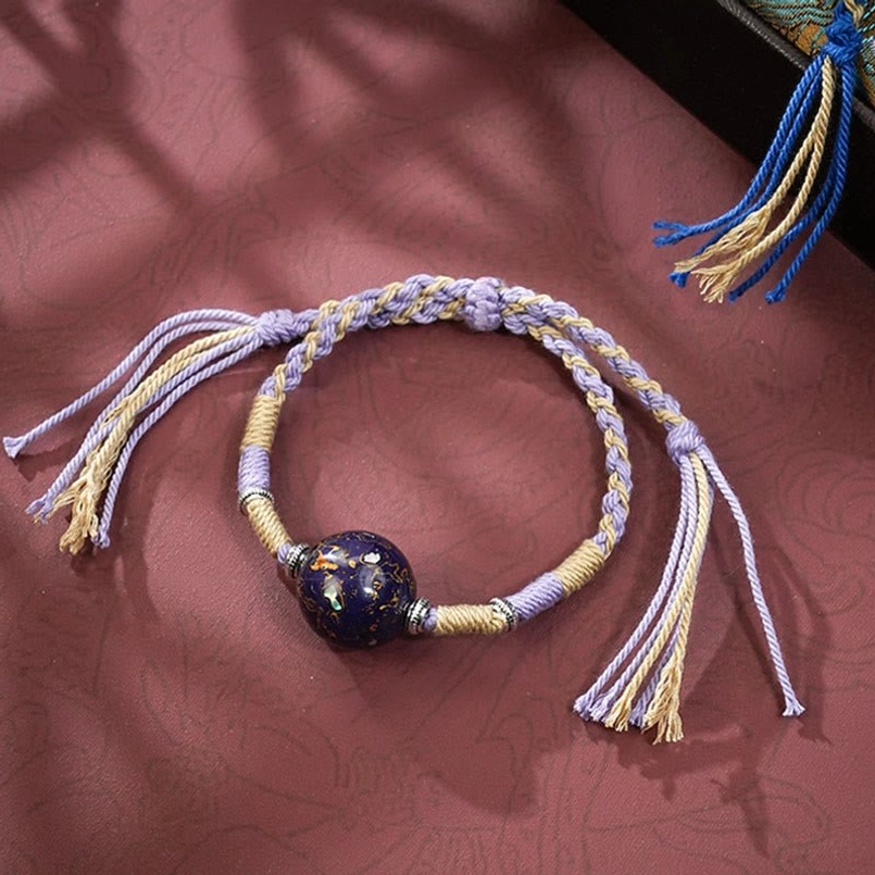 Purple blue lacquer bead red string bracelet with multiple tassel fringes