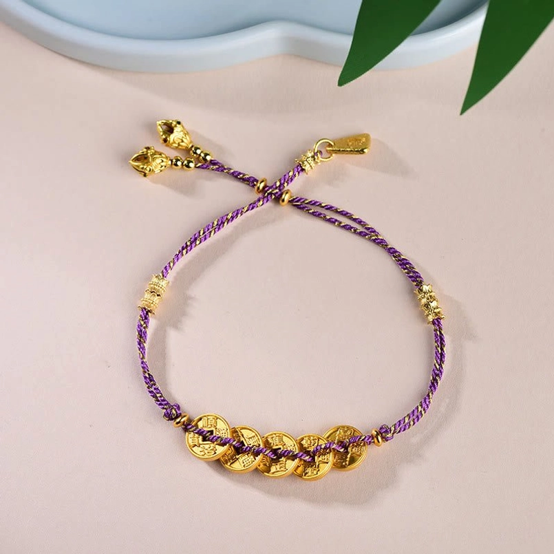 Purple Five-Emperor Coins red string bracelet representing spiritual wisdom and transformation