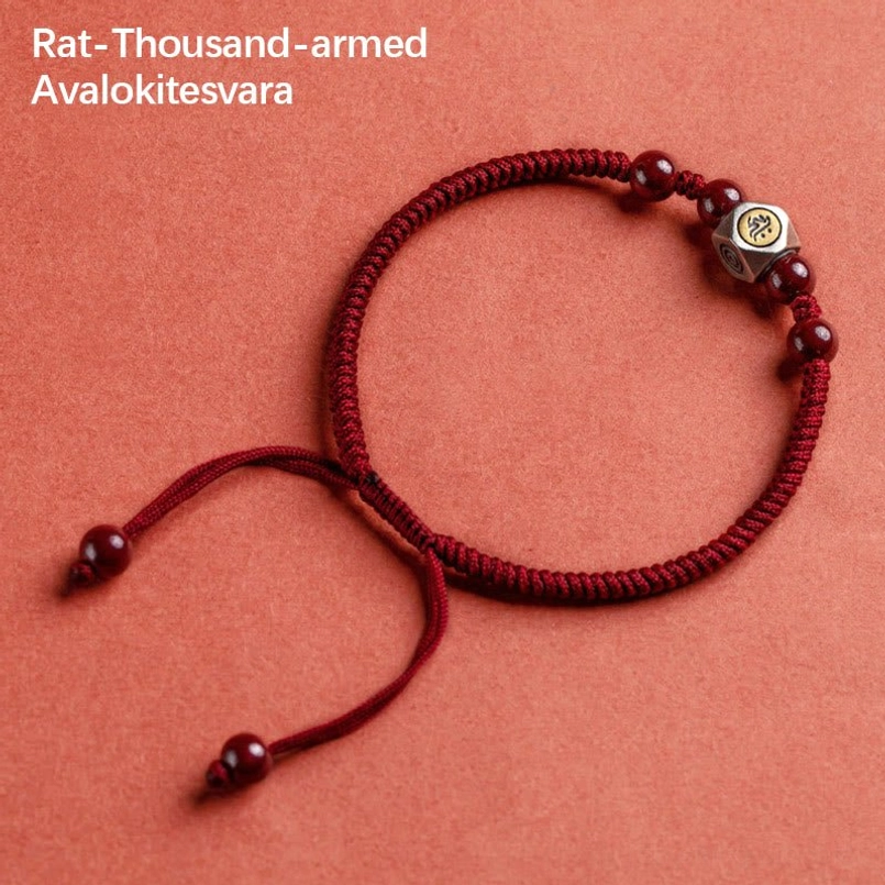 Single red braided zodiac natal buddha bracelet showing rat thousand-armed avalokitesvara sterling silver bead