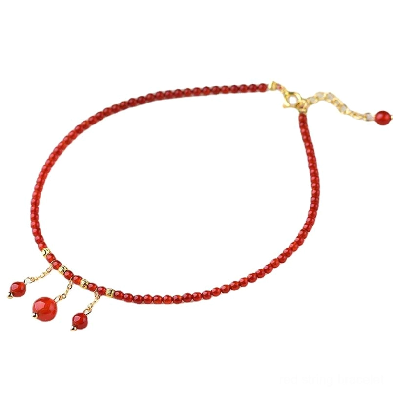 Red agate anklet adjustable design with triple dangling pendants and gold accents