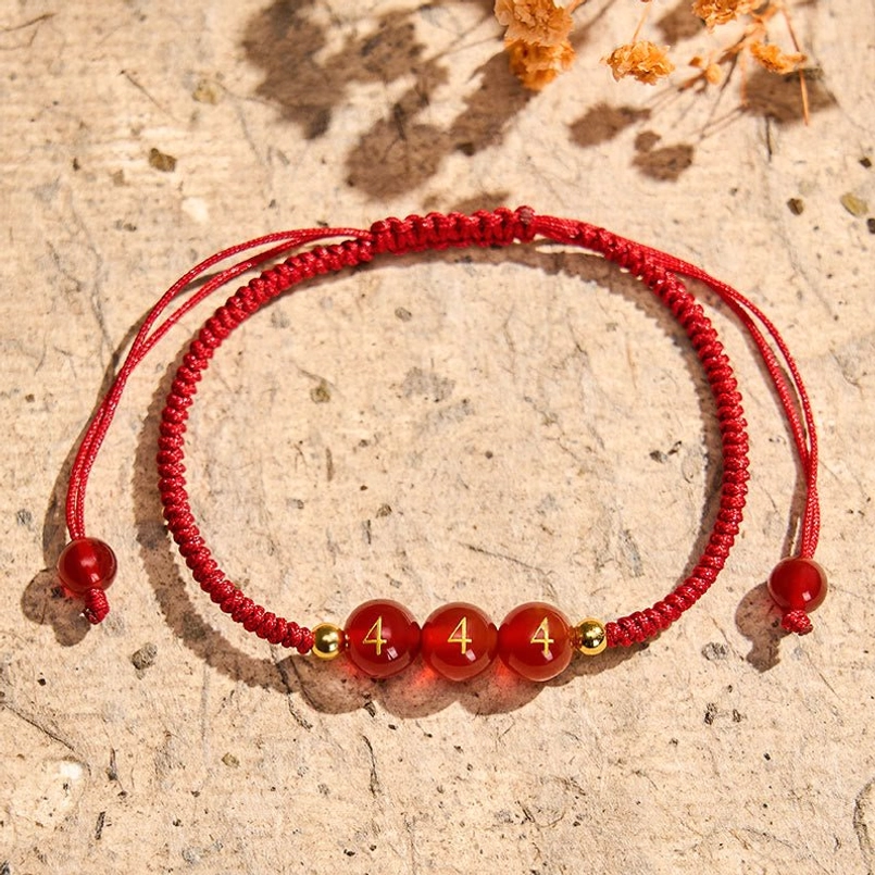 Red Agate Lucky Charm Bracelet with plain beads, adjustable red string cord and gold accents