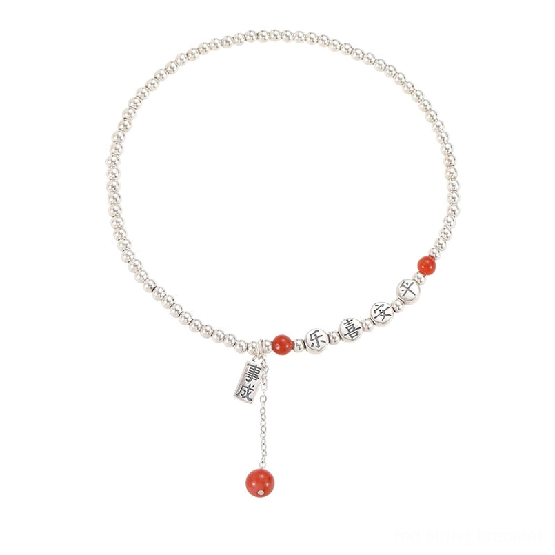 Red agate and 925 sterling silver blessing anklet showcasing craftsmanship and natural stone texture