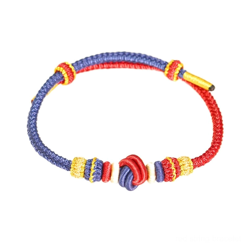 Two-tone red and blue braided peace knot bracelet front view with symmetric woven knots on light background