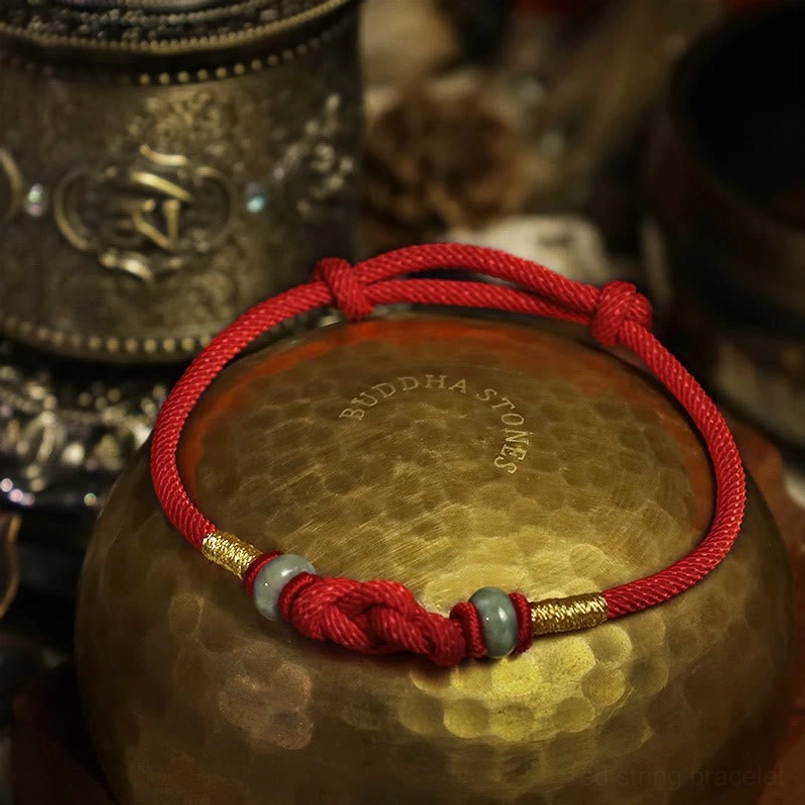 Handmade red cord jade bracelet with gold accents and adjustable design