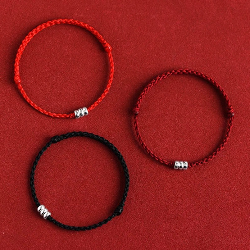 Red and dark red braided bracelets with sterling silver beads in multiple colors comparison