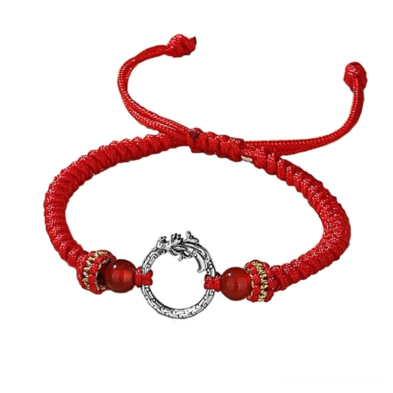 Red woven dragon phoenix bracelet - sterling silver charm close-up flat lay