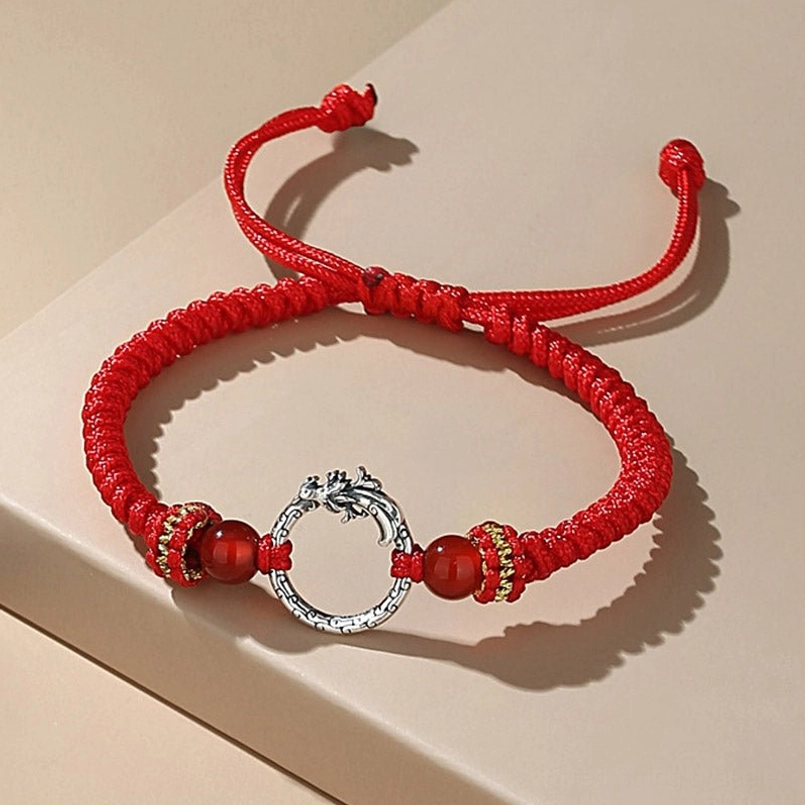 Red dragon phoenix lucky bracelet with silver peace buckle - close up detail