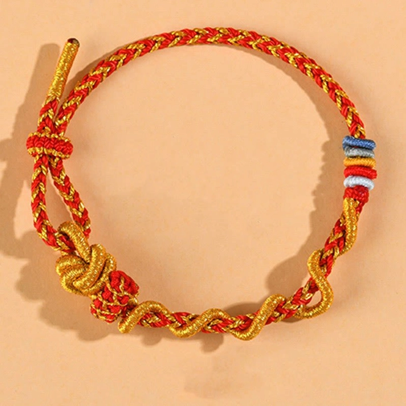 Red-gold dimple knot protection bracelet – handmade with natural materials