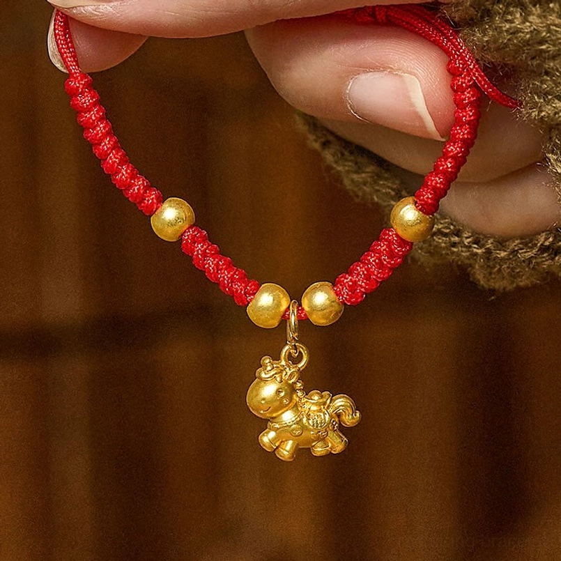 Red braided horse charm bracelet with 3D standing horse pendant and multiple copper gold beads