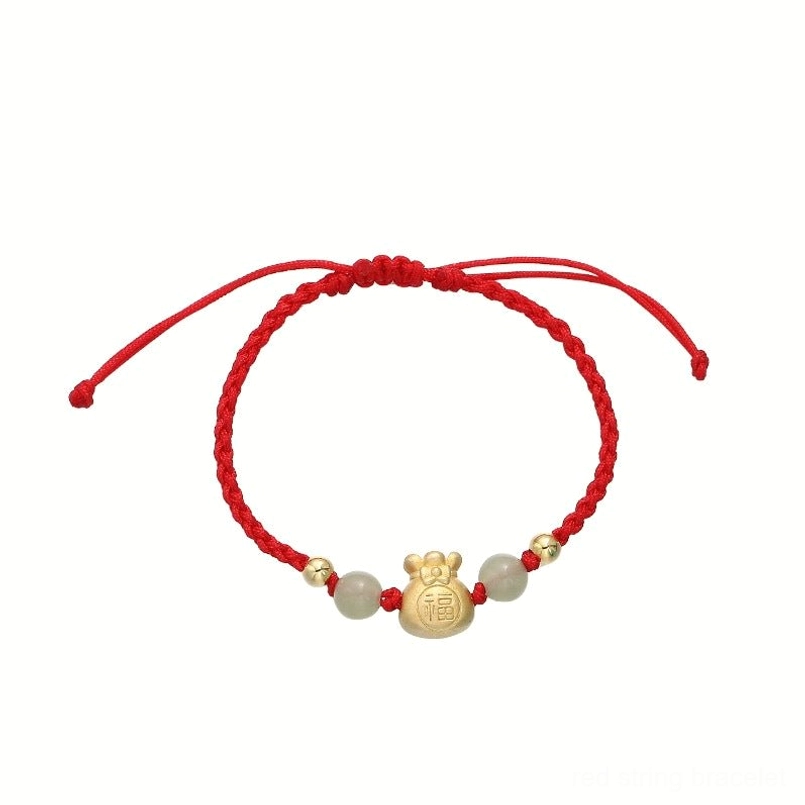 Single red lucky braided bracelet side view white background with gold Fu pouch charm